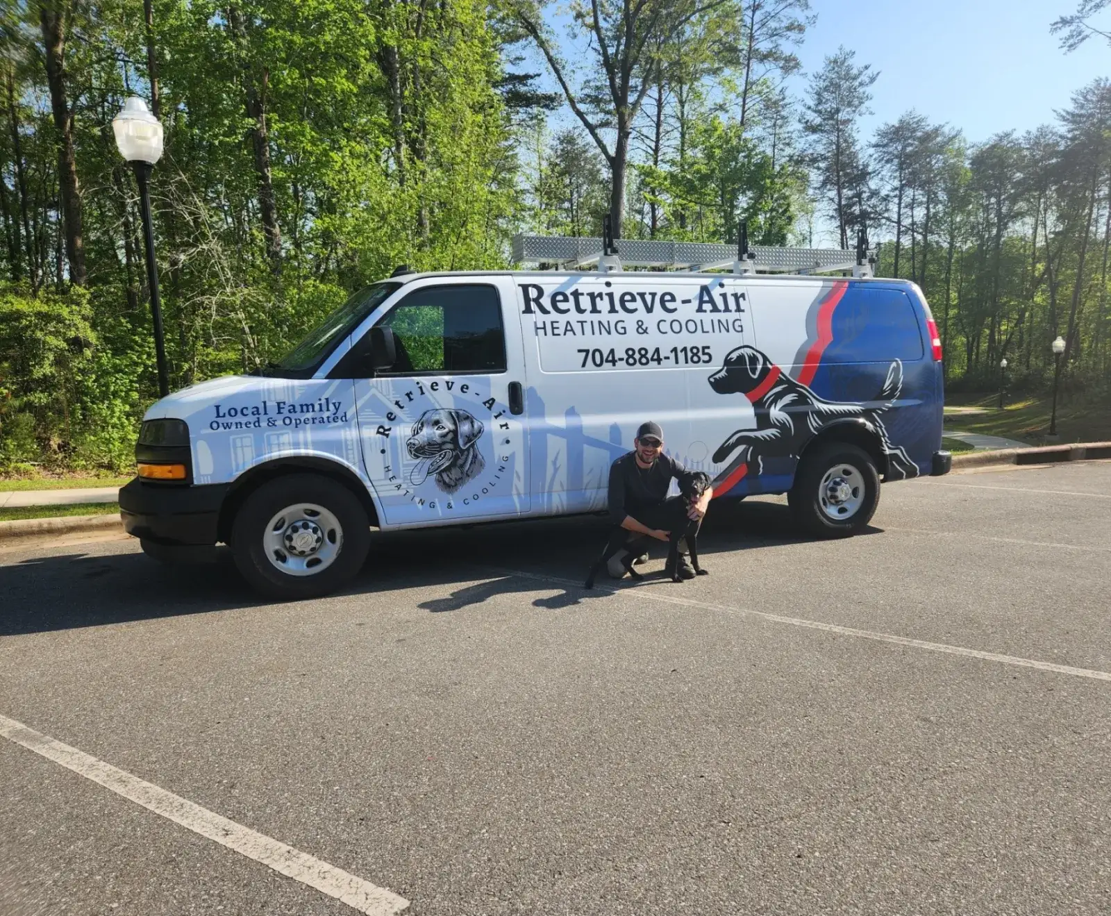 Lane Fagan — Owner of Retrieve-Air Heating and Cooling — with Ruby and the service van in Dallas, NC